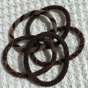 5 Sashka Co handcrafted glass bead bracelet lot. Brown/bronze colors. Approx 8”.